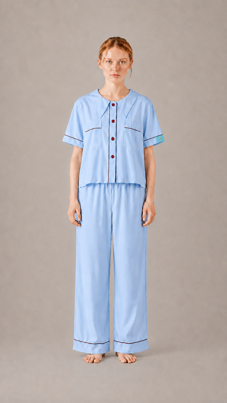 fornt view Woman wearing the PEKGEE Dream Of Tone Silent Flame Korean cotton linen pyjama set short sleeve long pants.