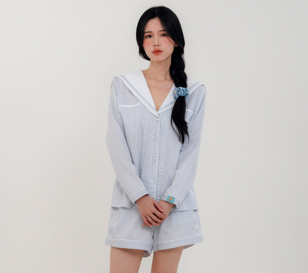 Front View
Woman wearing PEKGEE Sailorette Frosted Petals handmade premium cotton pyjama set.