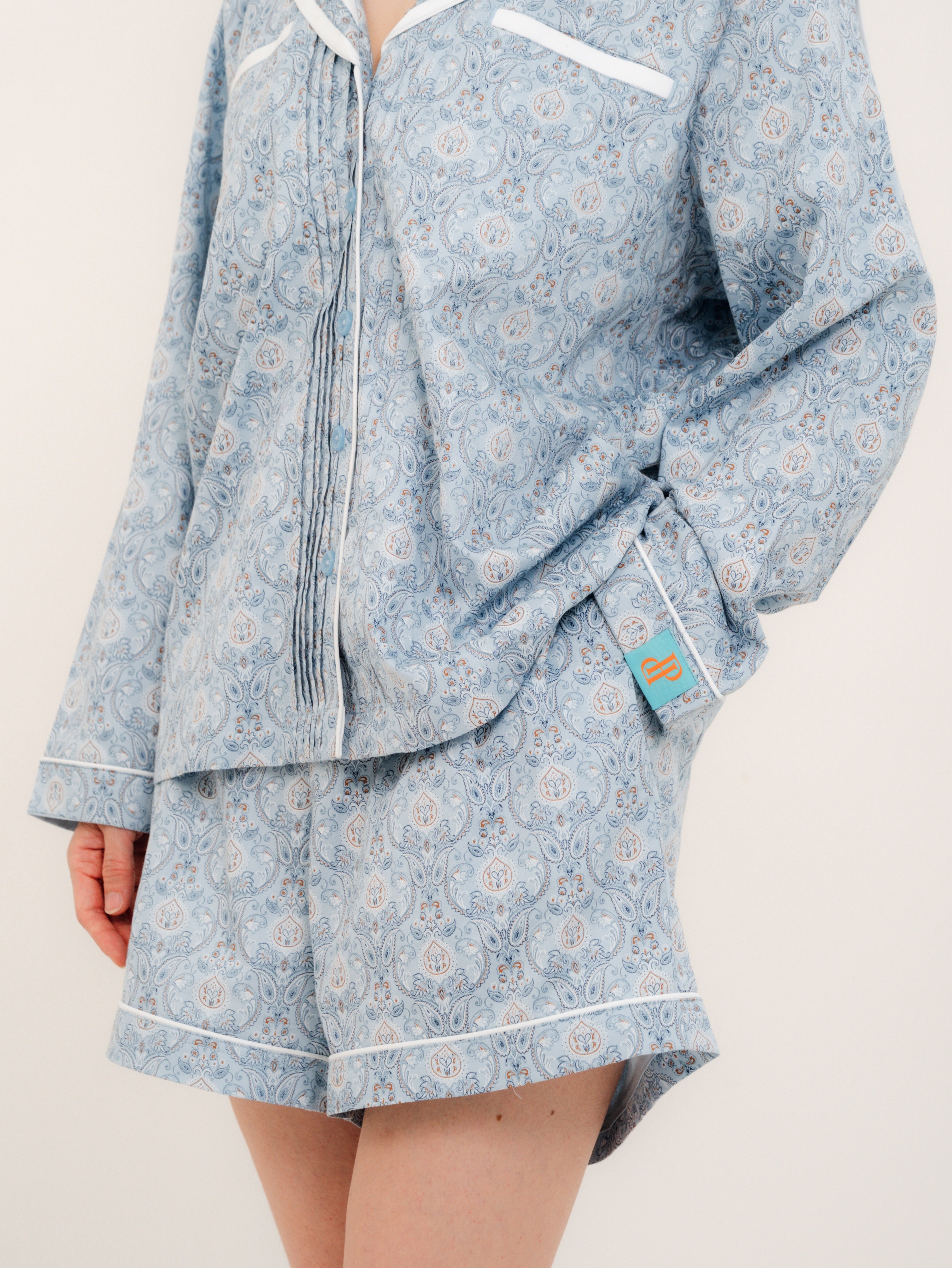 Close-up of the signature sailor collar on the PEKGEE Sailorette pyjama set. Double-layer bra-free friendly front pocket detail on the PEKGEE Sailorette pyjama set.