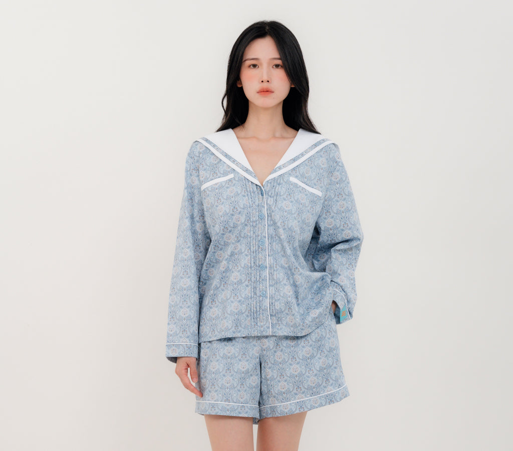 Front View
Woman wearing PEKGEE Sailorette Pastel Mirage handmade premium cotton pyjama set.