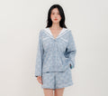 Front View
Woman wearing PEKGEE Sailorette Pastel Mirage handmade premium cotton pyjama set.