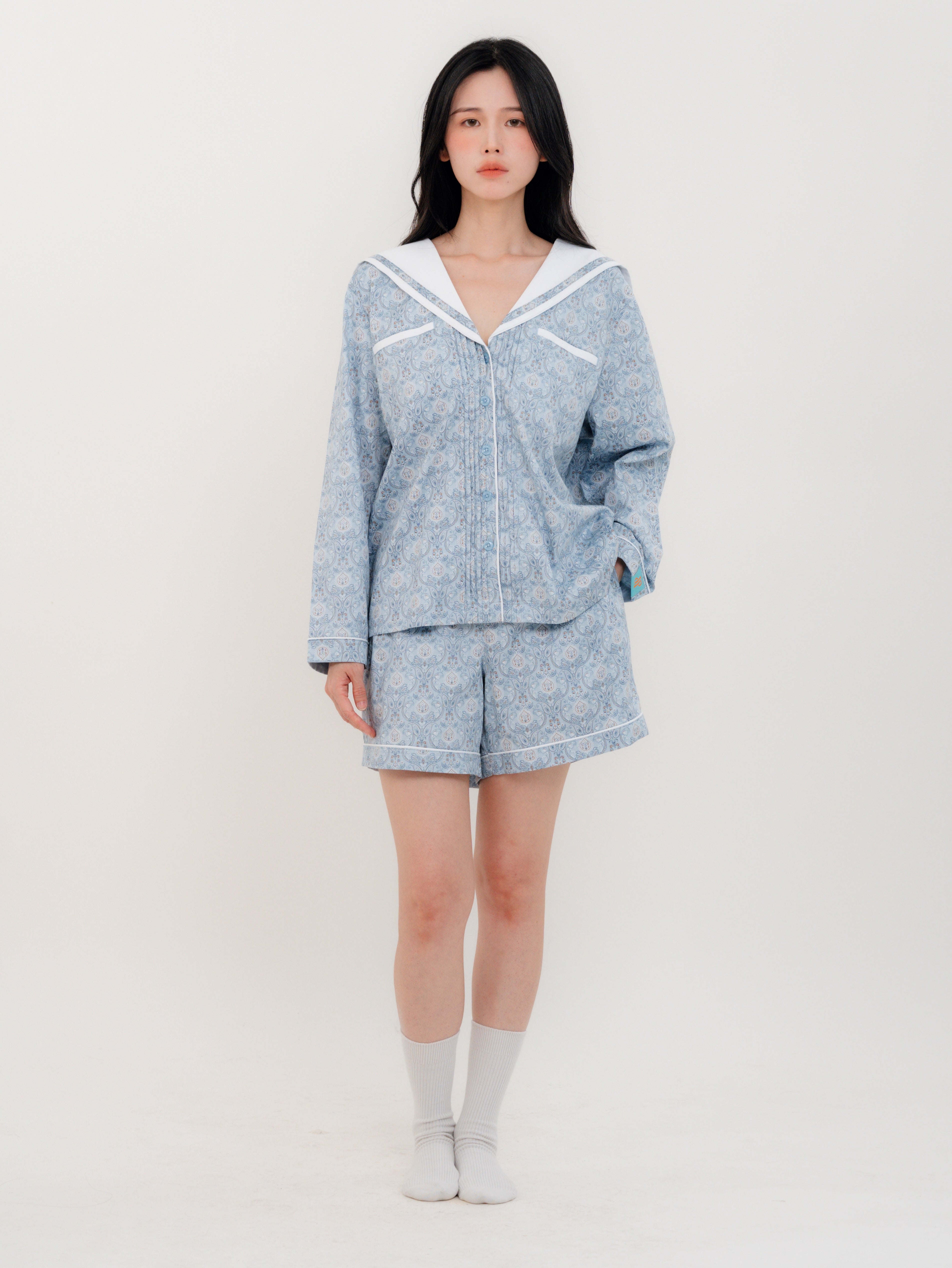 Front View Woman wearing PEKGEE Sailorette Pastel Mirage handmade premium cotton pyjama set.