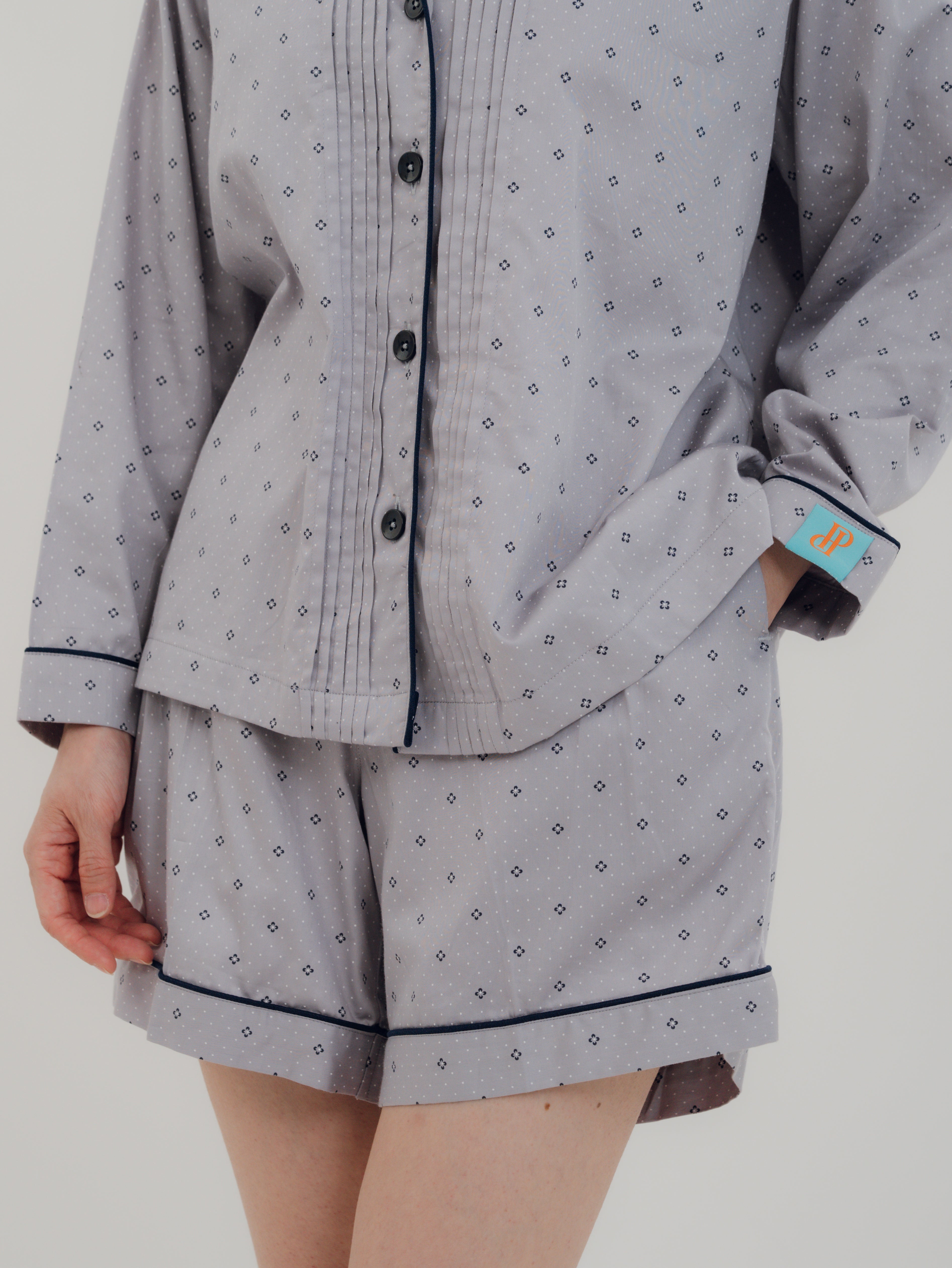 Close-up of the signature sailor collar on the PEKGEE Sailorette pyjama set. Double-layer bra-free friendly front pocket detail on the PEKGEE Sailorette pyjama set.