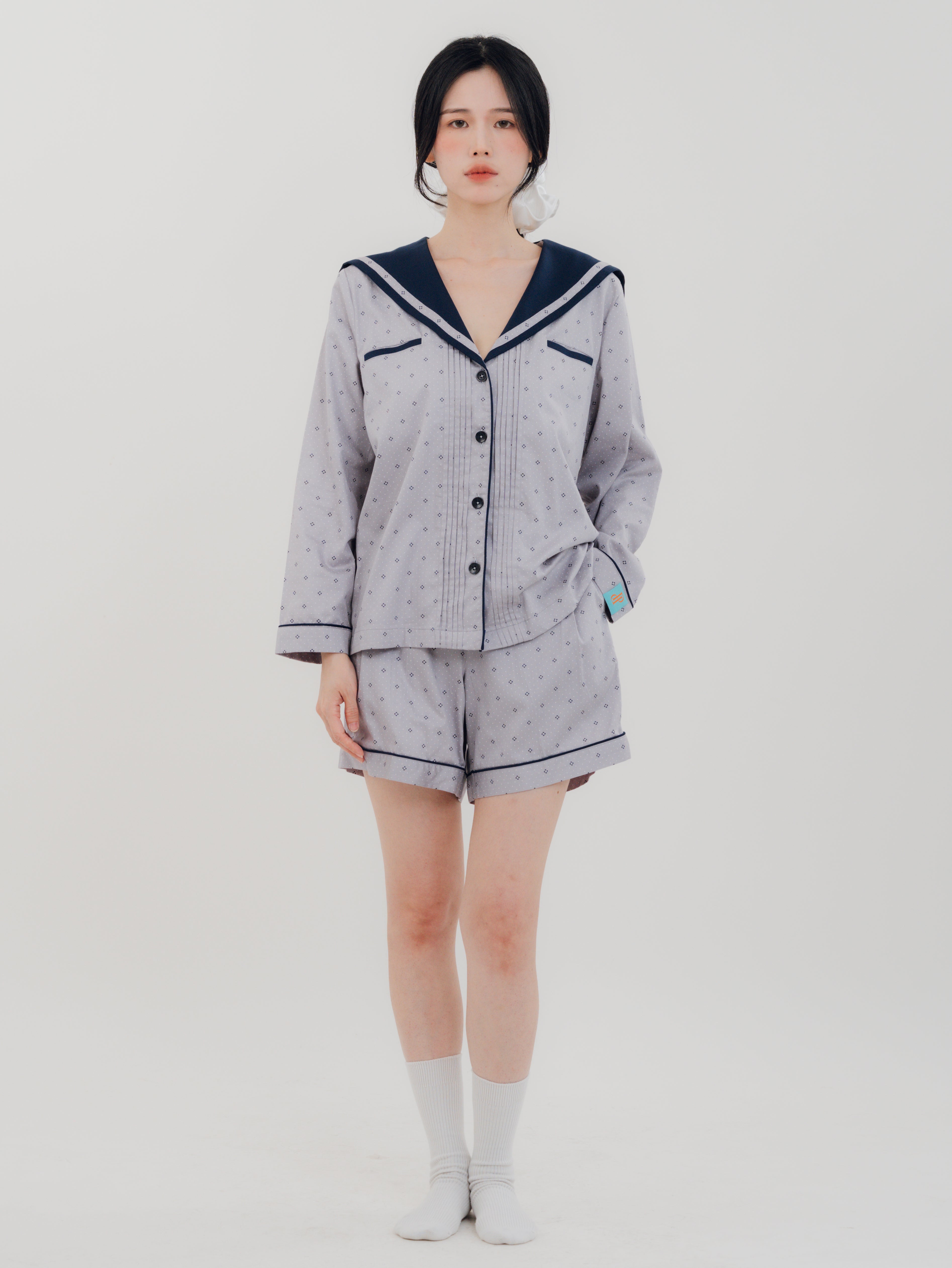 Front View Woman wearing PEKGEE Sailorette Twilight Calm handmade premium cotton pyjama set.